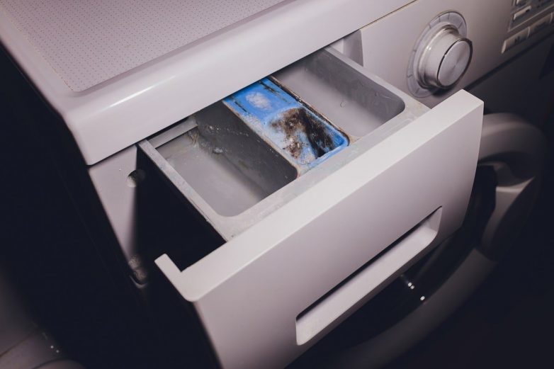 Чем почистить лоток стиральной машинки