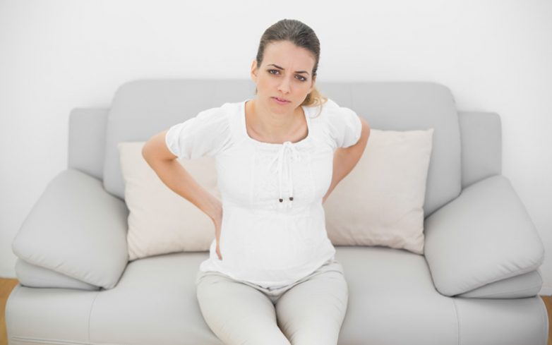 Как облегчить боль в спине во время беременности