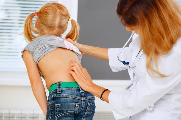 Причины и профилактика боли в спине у детей