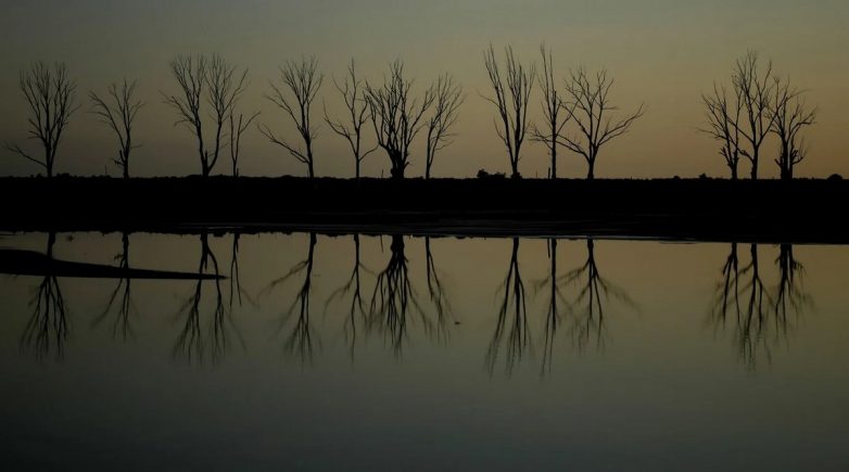 Аргентинская деревушка Вилья-Эпекуэн, смытая озером, стала туристической достопримечательностью